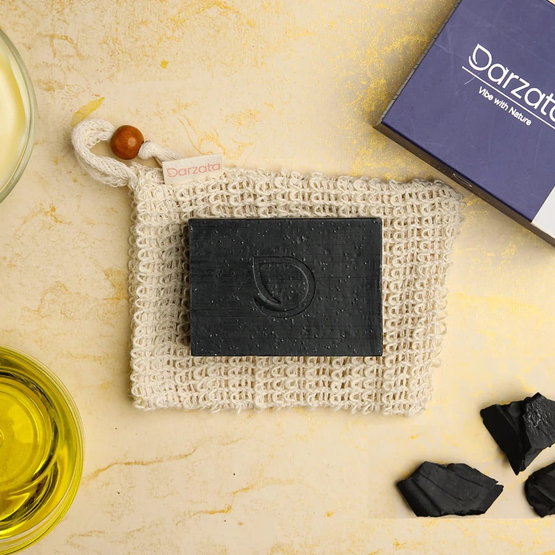 Top view of Darzata Charcoal Neroli and Hemp oil anti aging Soap with natural ingredients