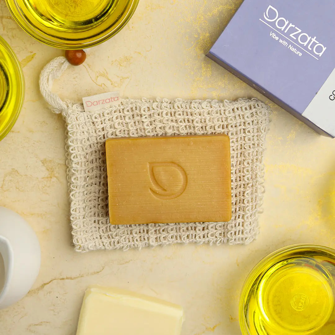 Top view of Darzata Coconut Milk Soap with natural ingredients