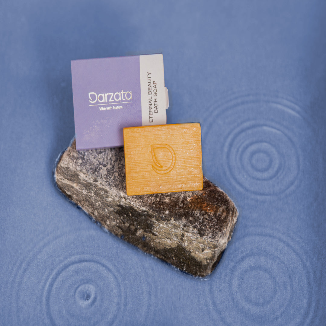 Green tea soap kept on a stone
