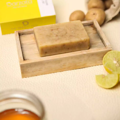 side view of Potato honey soap with darzata packaging and natural ingredients